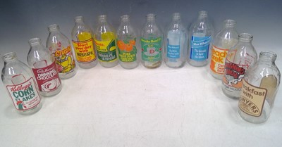 Lot 225 - Twelve Vintage Advertising Milk Bottles and a...