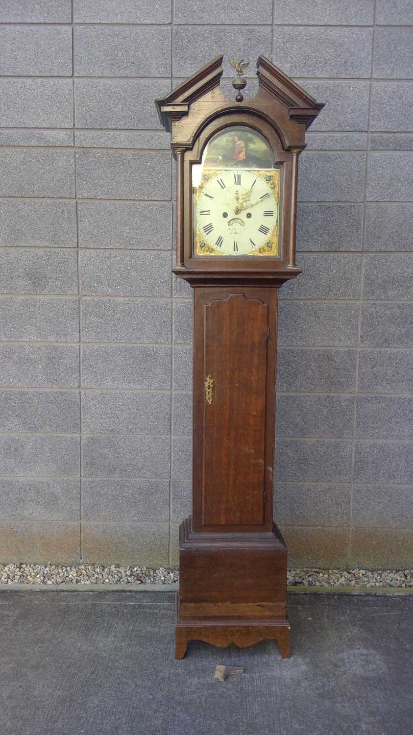 Lot 4 - An Antique Grandfather Clock. The Clock is...