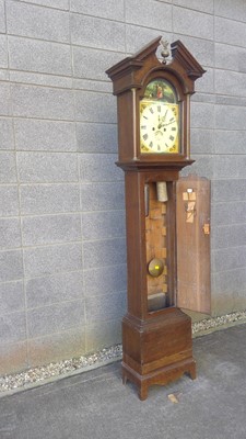Lot 4 - An Antique Grandfather Clock. The Clock is...