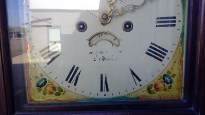 Lot 4 - An Antique Grandfather Clock. The Clock is...