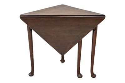 Lot 862 - An early George III mahogany single flap corner table.