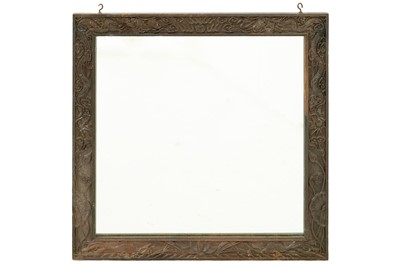 Lot 314 - A Chinese teak framed wall mirror.