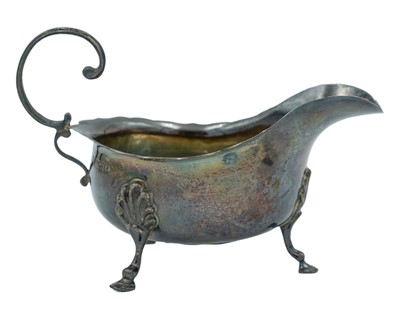 Lot 311 - A silver sauceboat by George Nathan & Ridley Hayes.