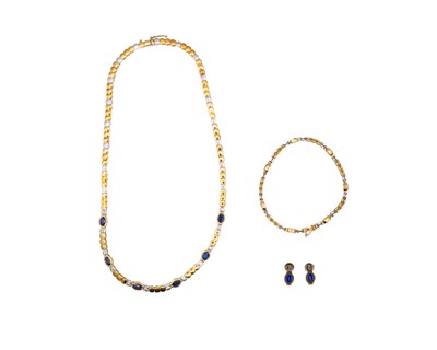 Lot 29 - An attractive modern 18k yellow and white gold diamond and sapphire set demi-parure.