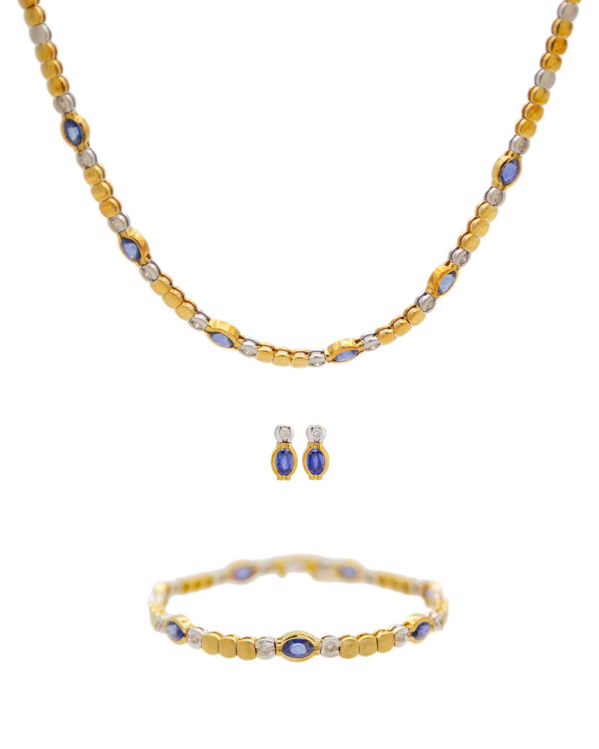 Lot 29 - An attractive modern 18k yellow and white gold diamond and sapphire set demi-parure.