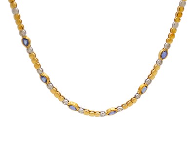 Lot 29 - An attractive modern 18k yellow and white gold diamond and sapphire set demi-parure.