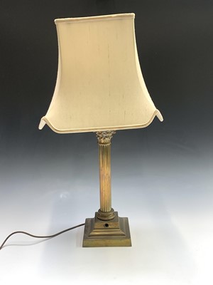 Lot 188 - A brass corinthian column lamp base. Height 43cm.