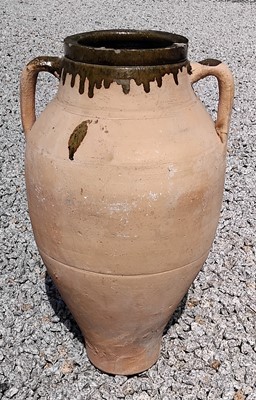 Lot 41 - A pottery olive jar.