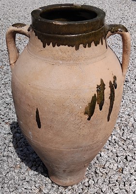 Lot 41 - A pottery olive jar.