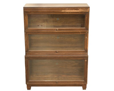 Lot 840 - An oak Globe Wernicke three section bookcase.