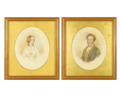 Lot 677 - A pair of Victorian oval watercolour portraits.