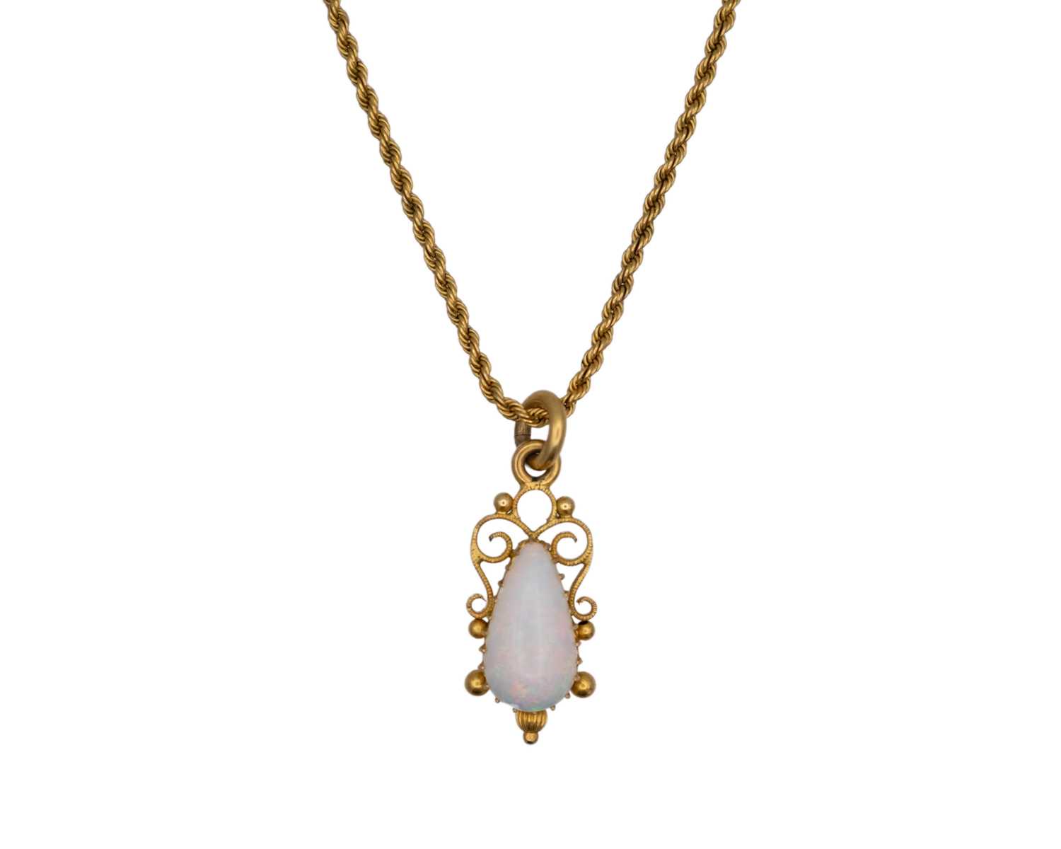 Lot 47 - A Victorian Etruscan Revival gold-mounted precious white opal set pendant, on a gold rope twist neck chain.