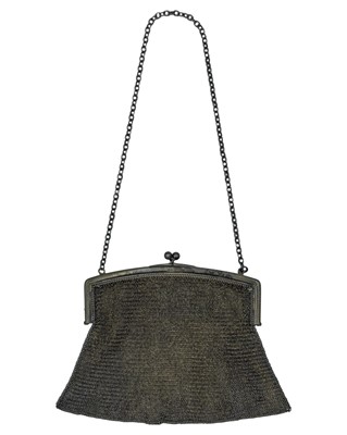 Lot 135 - A George V silver mesh purse.