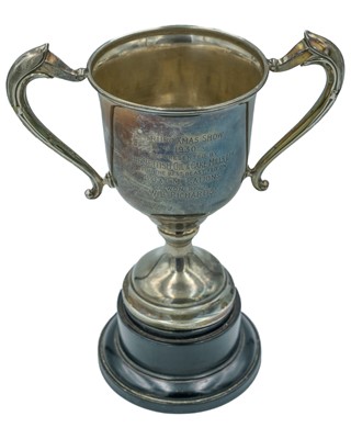 Lot 128 - A two-handled silver trophy.