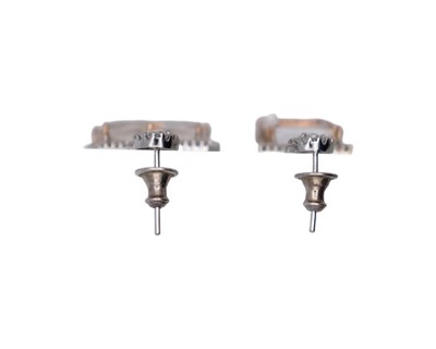 Lot A fine pair of 18k (tested) white gold, white zircon and diamond set cluster drop earrings.