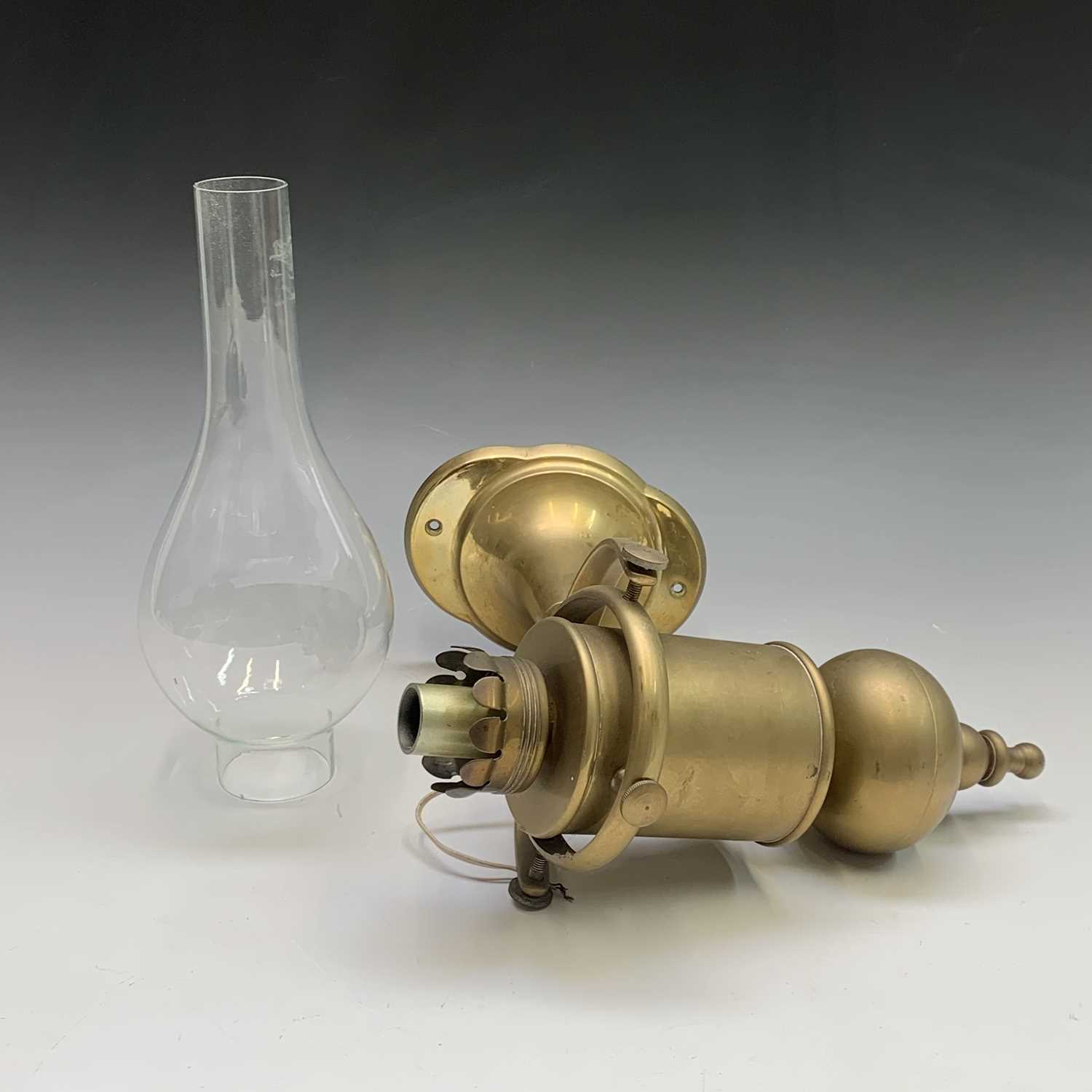 Lot 114 - A ship's brass gimbal lamp, converted for...