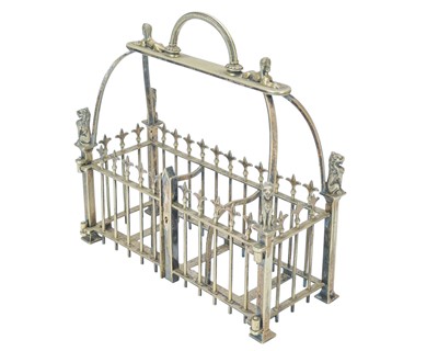 Lot 26 - An Egyptian Gothic revival tantalus frame.