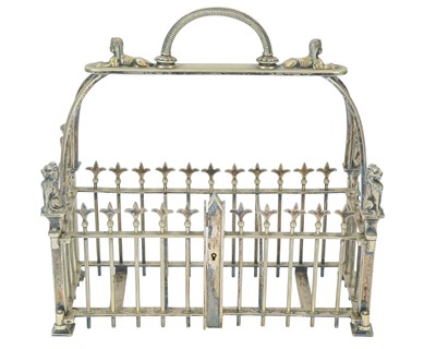 Lot 26 - An Egyptian Gothic revival tantalus frame.