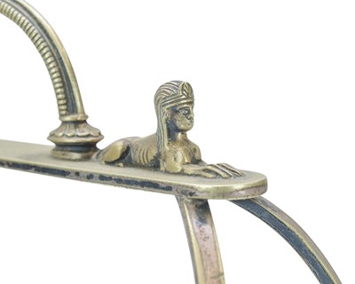 Lot 26 - An Egyptian Gothic revival tantalus frame.