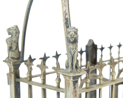 Lot 26 - An Egyptian Gothic revival tantalus frame.