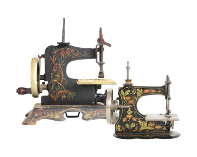 Lot 37 - Two miniature tinplate sewing machines.