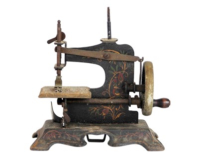 Lot 37 - Two miniature tinplate sewing machines.