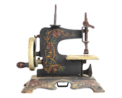 Lot 37 - Two miniature tinplate sewing machines.