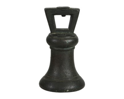 Lot 15 - A bronze 4lb bell weight.