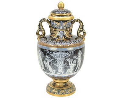 Lot 516 - A Sevres style pate sur pate vase and cover.