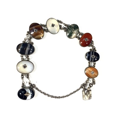 Lot 2375 - A silver and agate bracelet