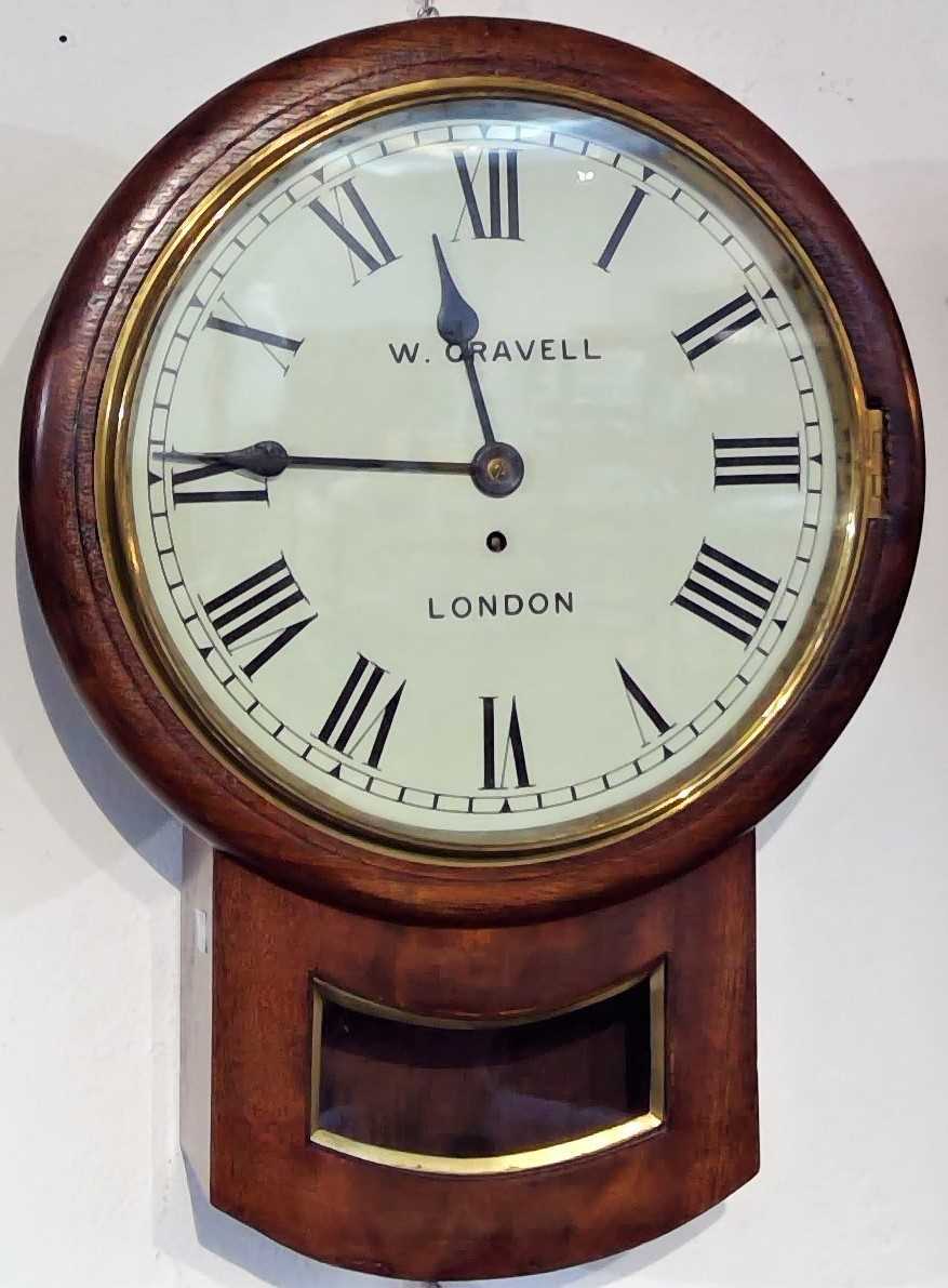 Lot 2913 - A walnut drop dial wall clock, the dial...