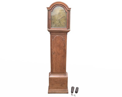 Lot 766 - An oak eight day longcase clock.