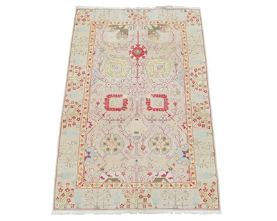 Lot 393 - A contemporary wool flatweave rug.