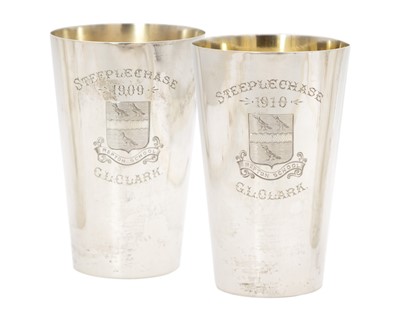 Lot 286 - A pair of silver beakers by Charles Edwards.