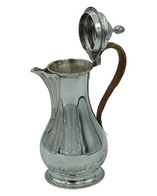 Lot 208 - A silver hot water pot by Daniel & John Wellby.