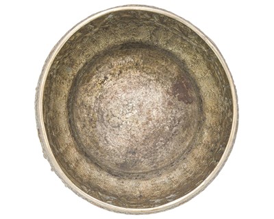 Lot 309 - A Burmese repousse silver bowl or thabeik.