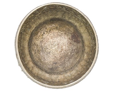 Lot 309 - A Burmese repousse silver bowl or thabeik.