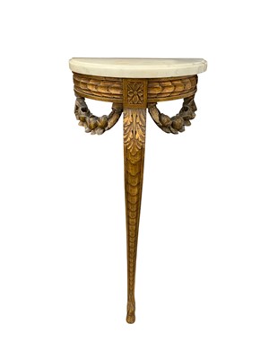 Lot 789 - A carved giltwood console table.