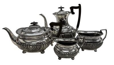 Lot 71 - Silver plate four-piece tea set.