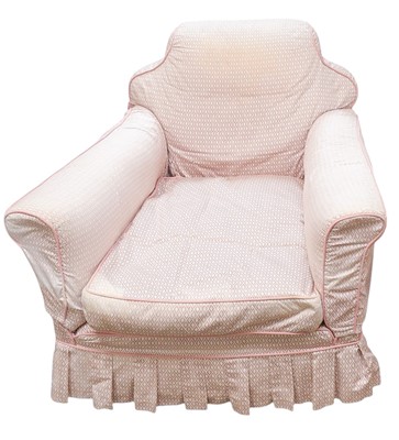 Lot 878 - A Howard & Sons Ltd upholstered armchair, with shaped back.