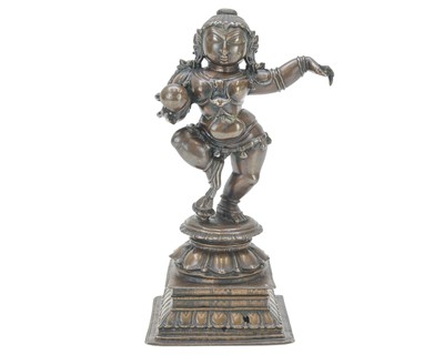 Lot 378 - An Indian bronze figure of Krishna.