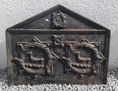 Lot 105 - A cast iron crested fireback.