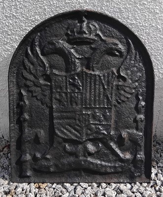 Lot 39 - An arched top cast iron fireback.