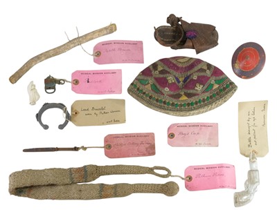 Lot 9 - A collection of North West Indian artefacts.