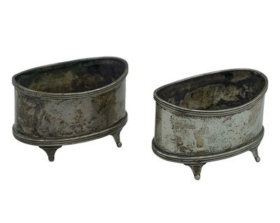 Lot 328 - A pair of George V silver oval section salts.