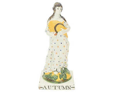 Lot 610 - A Dixon, Austin & Co, Sunderland pearlware figure of Autumn.