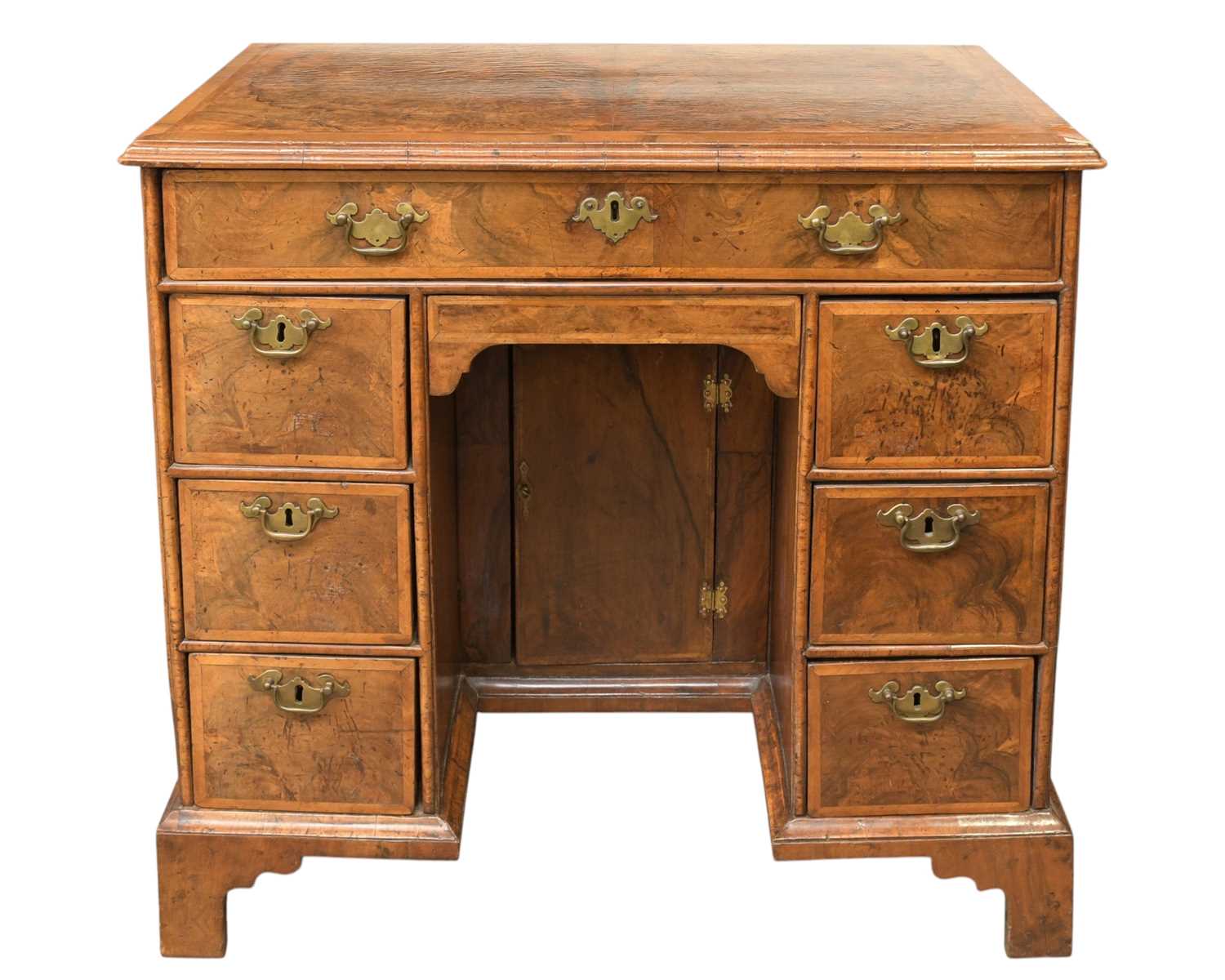 Lot 834 - A George II walnut kneehole desk or dressing table.