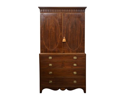 Lot 803 - A Regency mahogany and crossbanded linen press.
