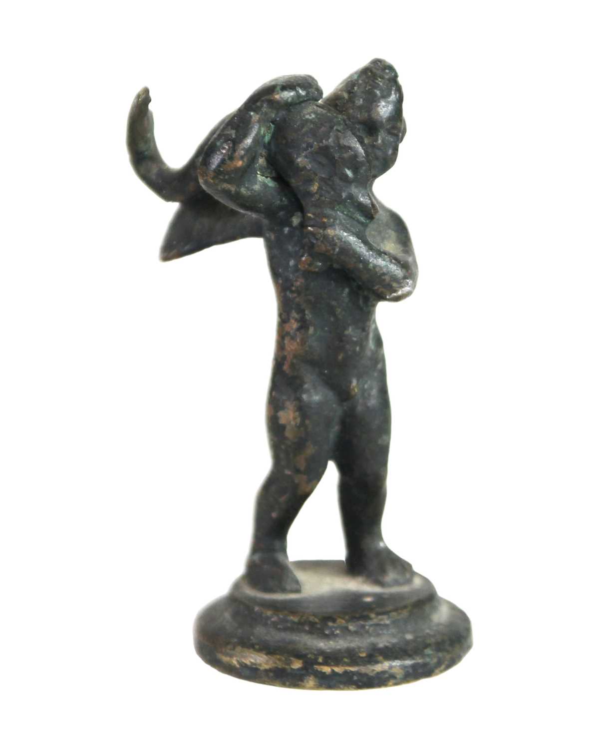 Lot 17 - A Grand tour type bronze figure of a cherub with a fish.