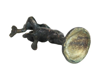 Lot 17 - A Grand tour type bronze figure of a cherub with a fish.